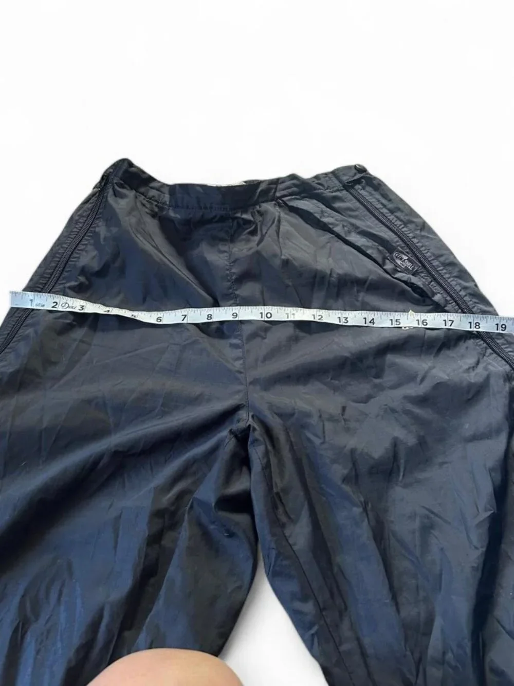 Adidas navy track pants with yellow stripes and zipper pockets size medium